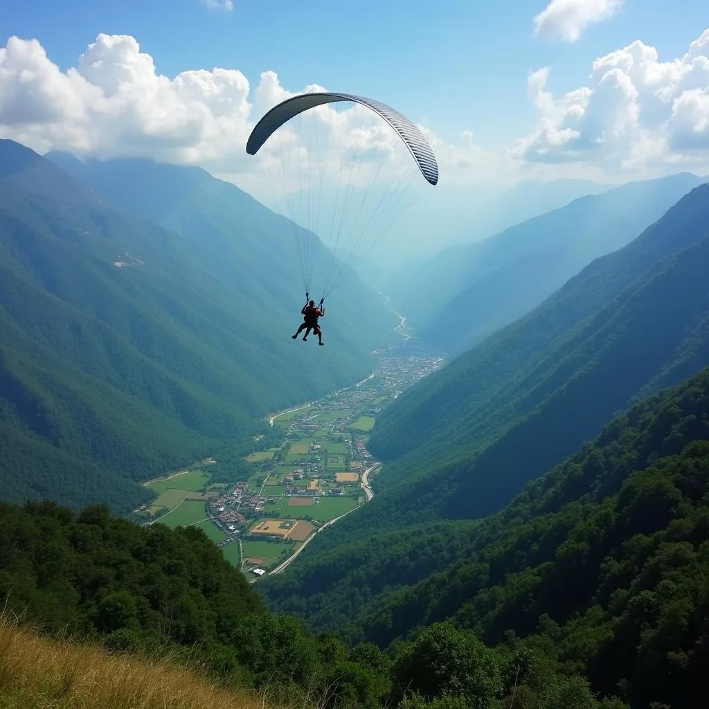 Thrill-seekers paragliding over Khandala valley