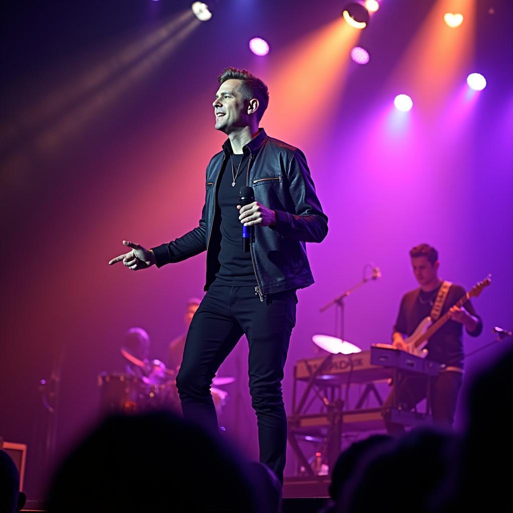 Adam Trent performing on stage during his 2019 tour.