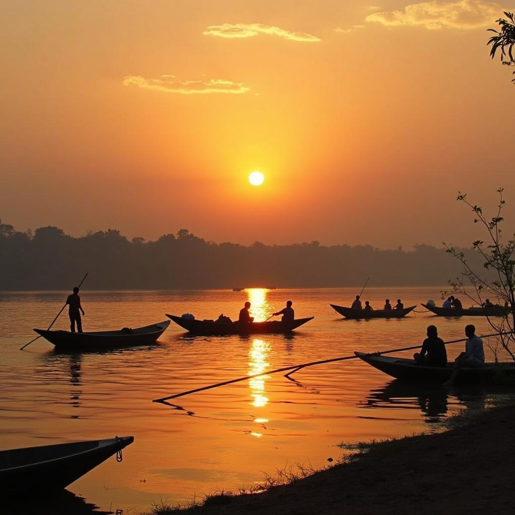 Sunset over the Tungabhadra River in Hampi with coracles in the foreground.